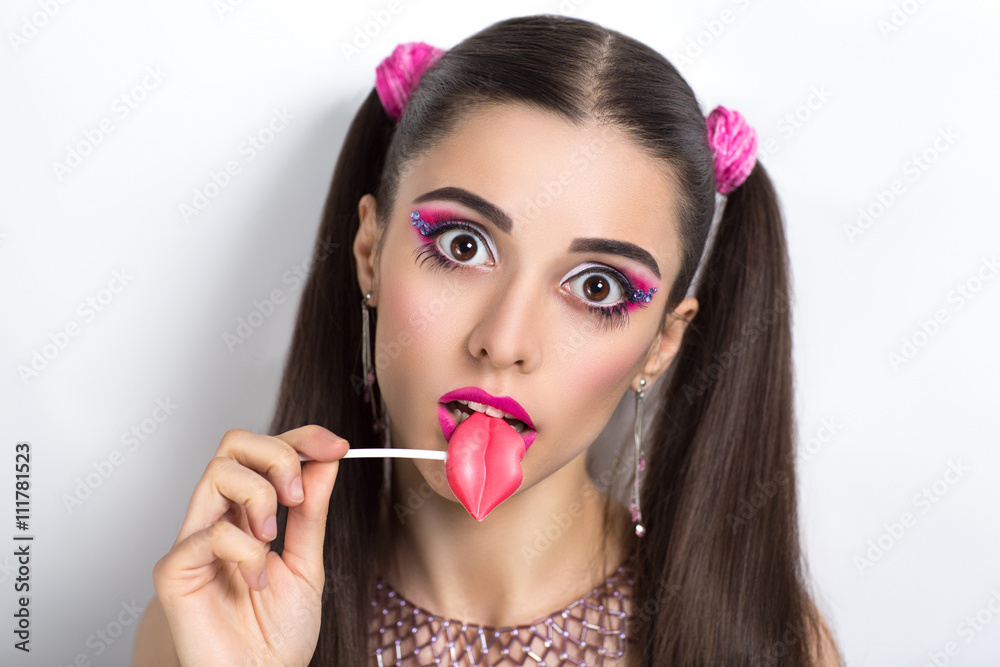 Portrait of beautiful young sexy lady, model, woman, actress, doll. Perfect  makeup, long eyelashes, clean leather, gentle pink lips. Image can be used  for advertising means skin care, cosmetic, suck Stock Photo