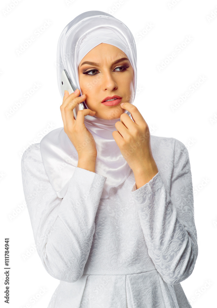 Muslim young woman with mobile phone Muslim young woman with mobile phone