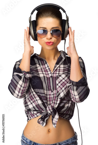 Young girl in jeans listen music