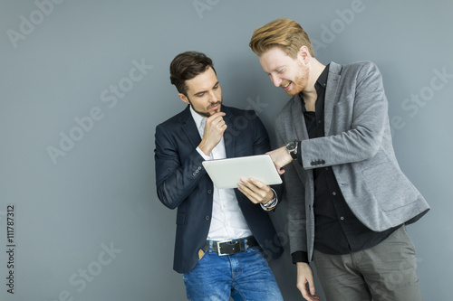 Young men with tablet