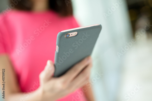Woman holding a phone