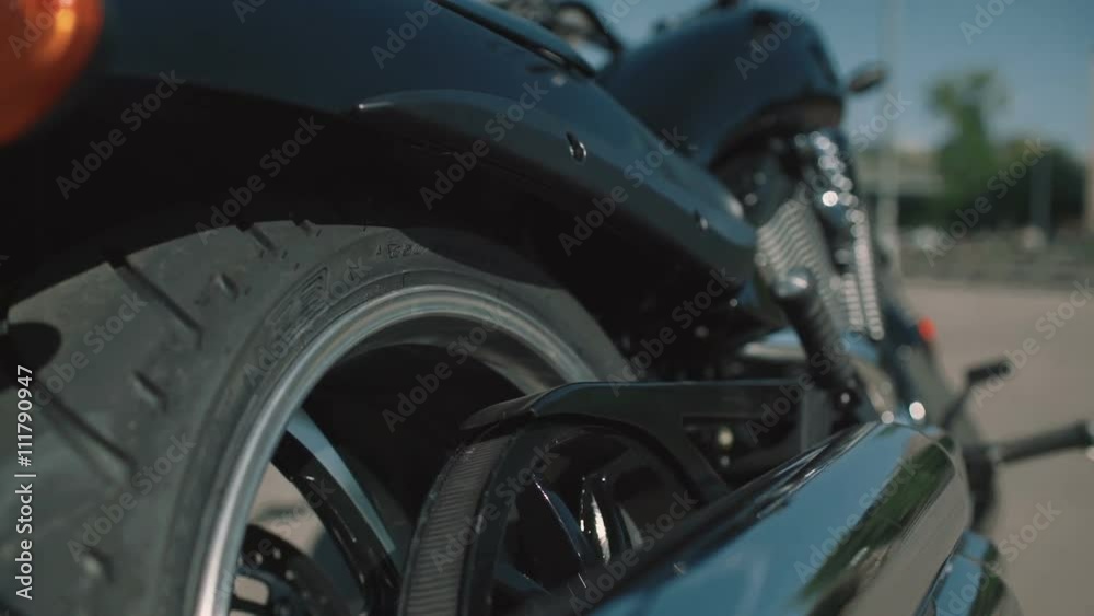 Business biker gets on a motorcycle