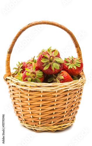 Fresh strawberries in a basket isolated
