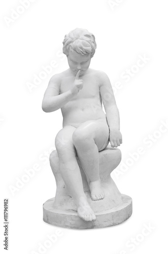 sculpture of the boy, pressing a finger to her lips