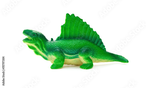 side view green dimetrodon toy on a white background