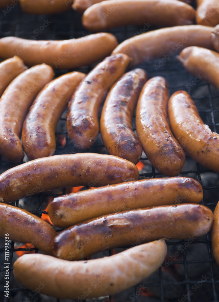 Sausages on a grill.