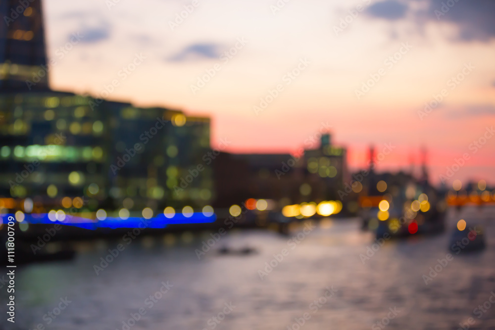 City of London at twilight and first night's lights, blur background