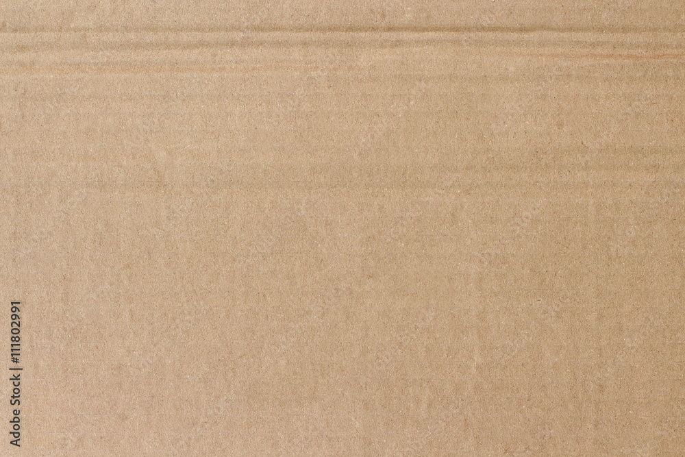background made of a closeup of brown cardboard background made of a closeup of brown cardboard