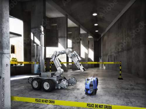Slika na platnu Police controlled bomb squad robot inspecting a suspicious backpack item inside a building interior