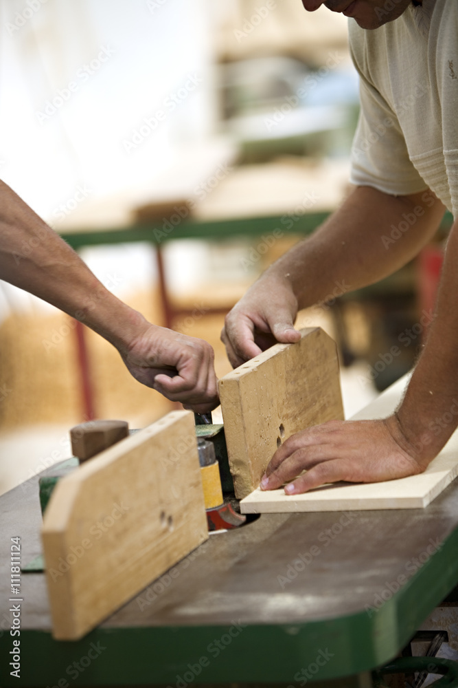 The hands of carpenters working. The hands of carpenters working.