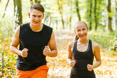 Fototapeta Naklejka Na Ścianę i Meble -  Exercising outdoor runners