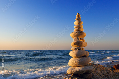 Photography Concept of harmony and balance. Rock Zen at sunset. Balance and