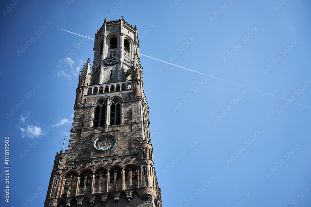 Belfry of Bruges in Belgium / Looking up Belfry - landmark of Bruges