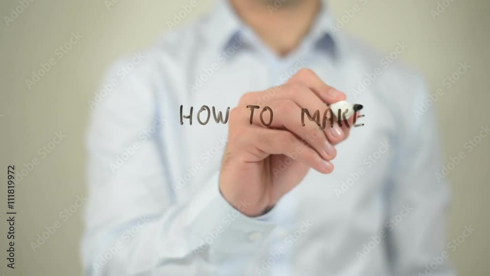 How To Make Money By Blogging , man writing on transparent screen How To Make Money By Blogging , man writing on transparent screen
