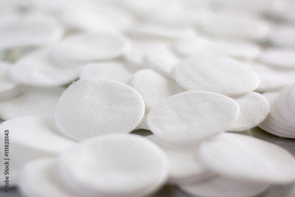 Cotton round cosmetic pads, evenly distributed Cotton round cosmetic pads, evenly distributed