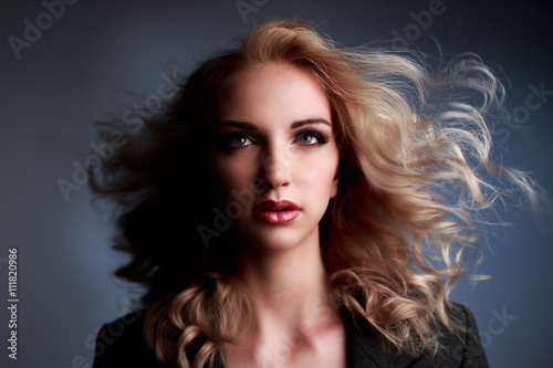 Portrait of beautiful young woman in Studio