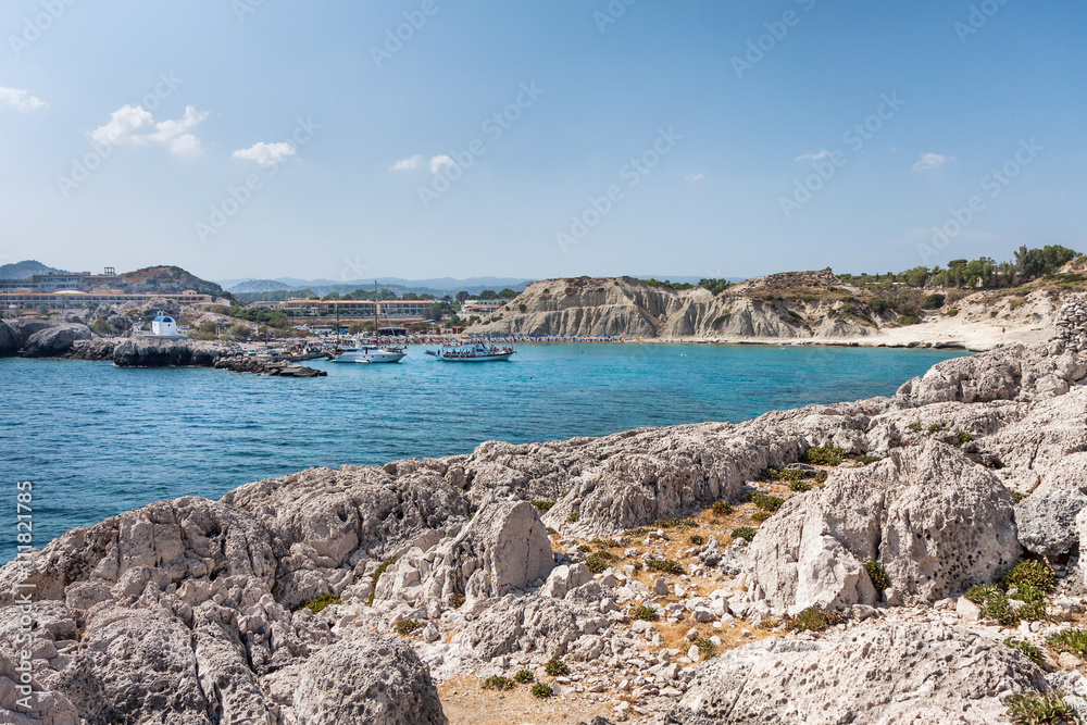 Kolymbia beach with the rocky coast in Greece.