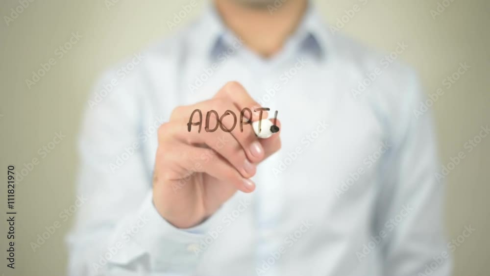 Adortion Is Love , man writing on transparent screen Adortion Is Love , man writing on transparent screen
