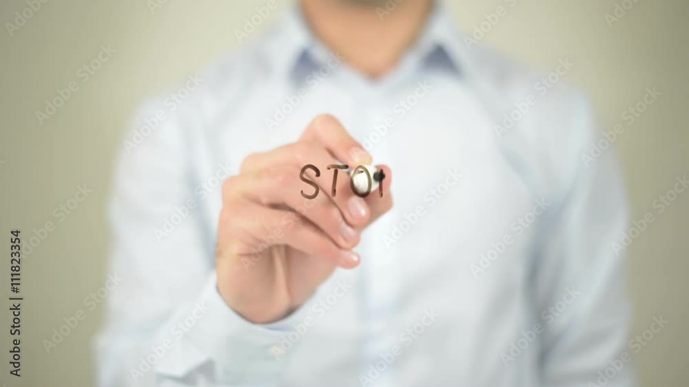Stop Hate , man writing on transparent screen