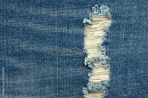 Denim with hole, close up, background