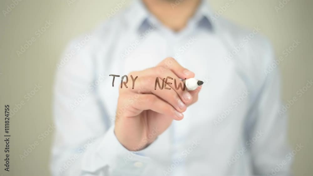 Try New Stuff , man writing on transparent screen Try New Stuff , man writing on transparent screen