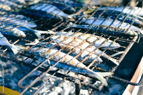 Mackerel roast on grill barbecue, flat lay, closeup top view photo