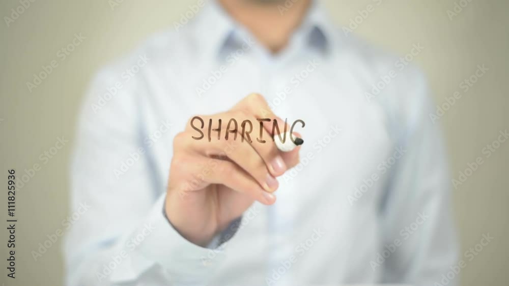 Sharing Results, man writing on transparent screen Sharing Results, man writing on transparent screen