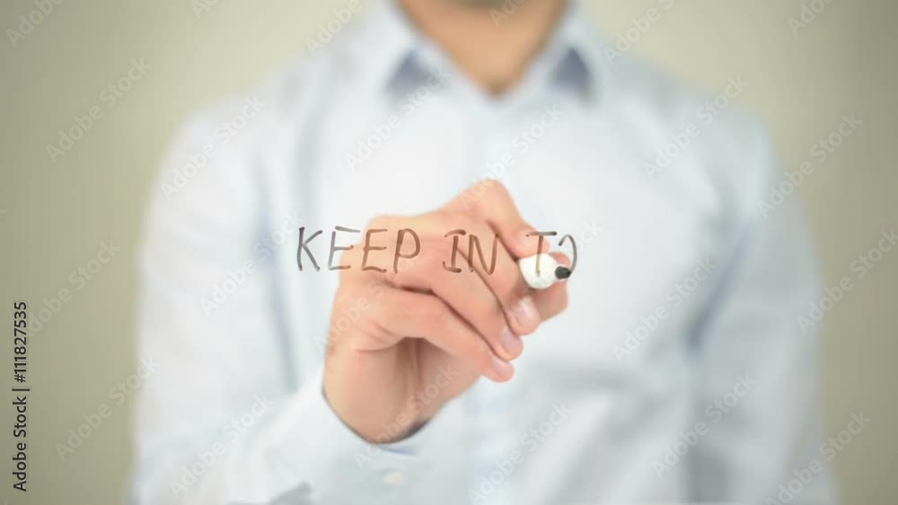 Keep In Touch , man writing on transparent screen Keep In Touch , man writing on transparent screen