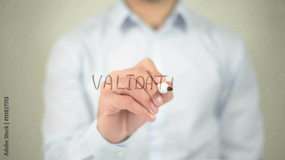 Validation , man writing on transparent screen Validation , man writing on transparent screen