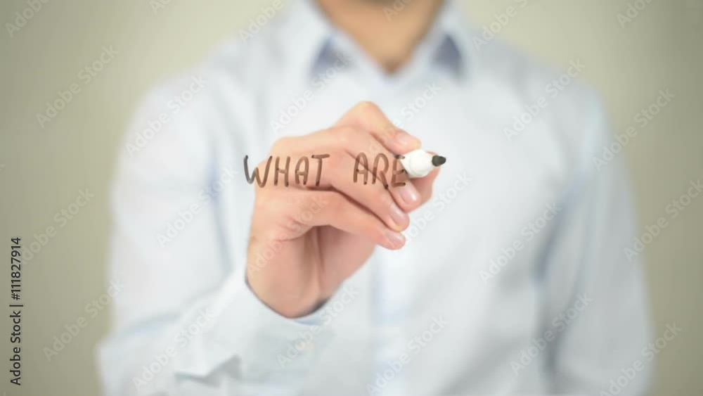 What Are Your Hobbies , man writing on transparent screen What Are Your Hobbies , man writing on transparent screen