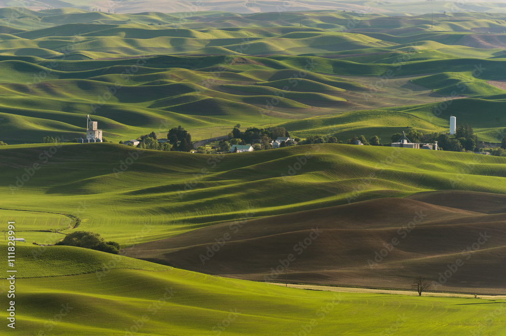 Washington Palouse. A spectacular sunset view from Steptoe Butte State Park of the surrounding farmland and small towns. From the top of the butte, the eye can see 200 miles.