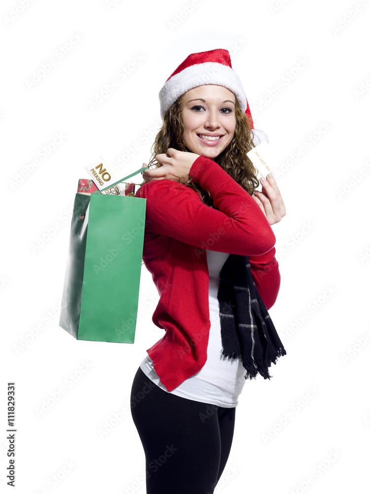 portrait of a smiling young female carrying shopping bags. portrait of a smiling young female carrying shopping bags.