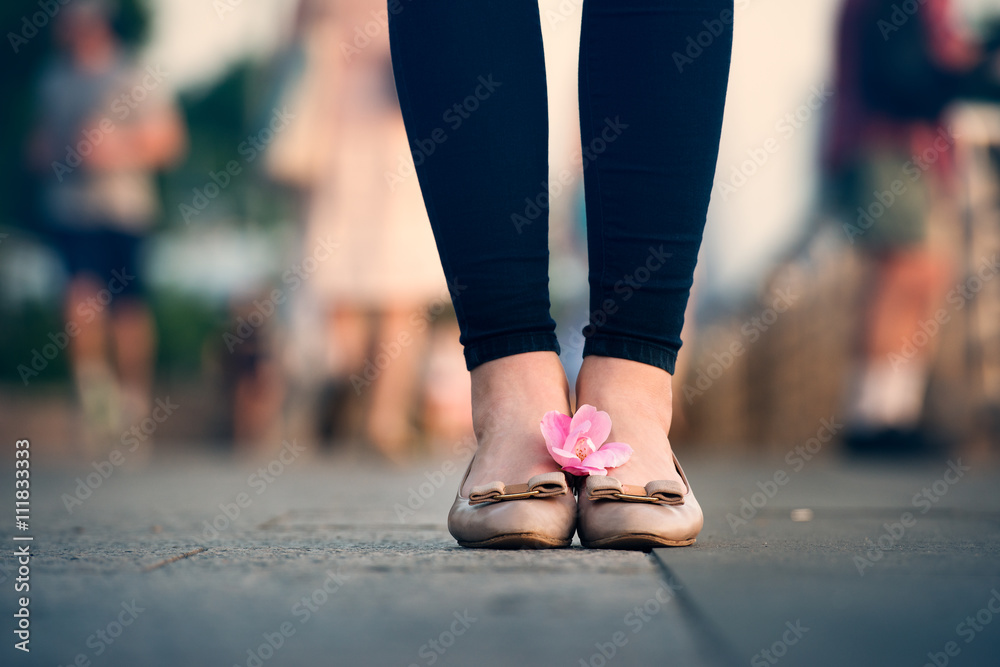Woman feet and legs with shoes outdoors