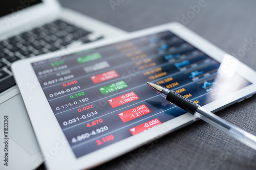 Tablet computer with stock exchange data photo
