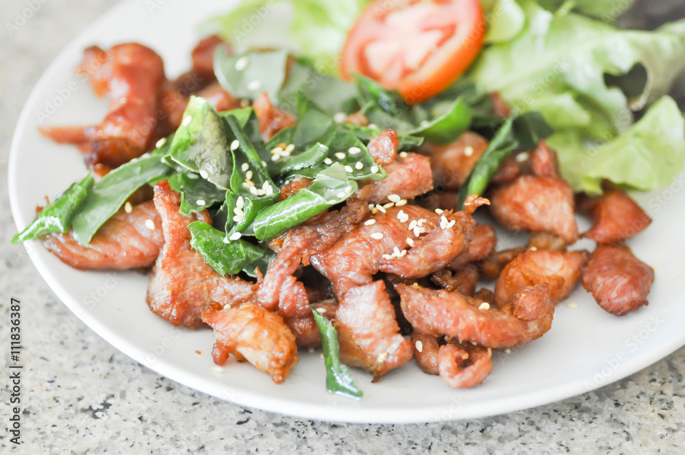 fried pork with sesame and leech lime leaf fried pork with sesame and leech lime leaf