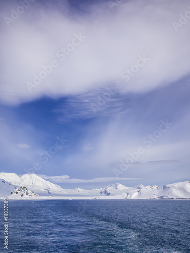 sun and spectacular coulds over antarctica - stock image