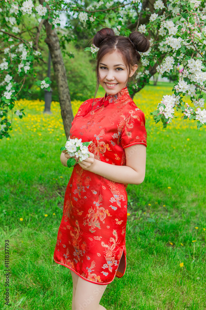 Beautiful asian girl in traditional chinese red dress. Beautiful asian girl in traditional chinese red dress.