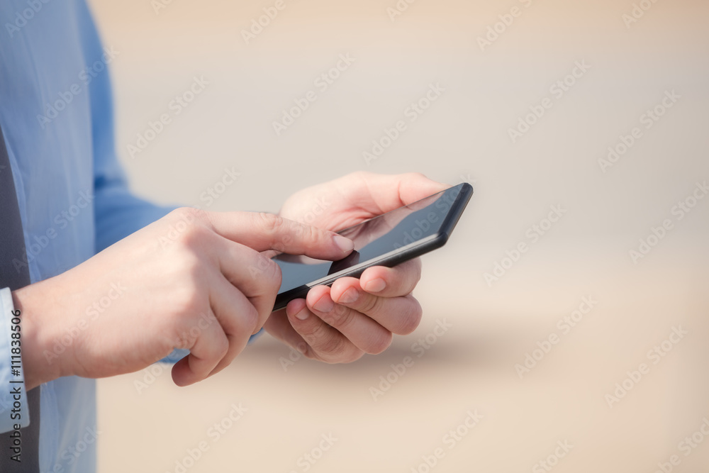 Texting on a smartphone. Shallow depth of field. Texting on a smartphone. Shallow depth of field.