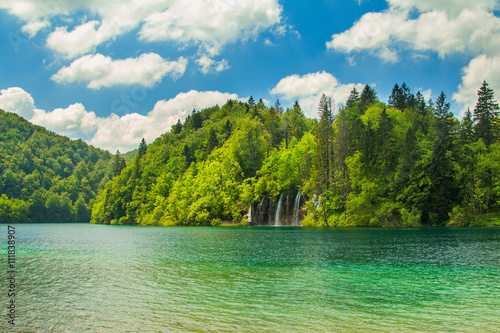  Beautiful landscape, waterfall and clear green water in the Plitvice Lakes National Park in Croatia 