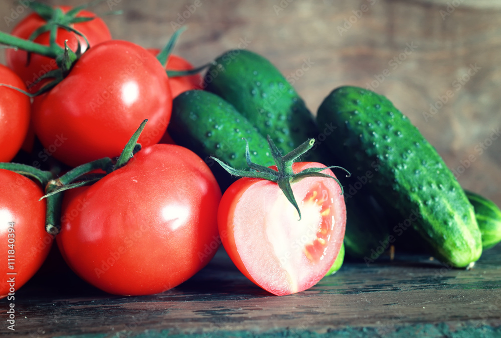 tomatoes on wooden background tomatoes on wooden background