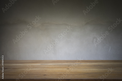 Wooden table or floor platform and polished concrete surface bac