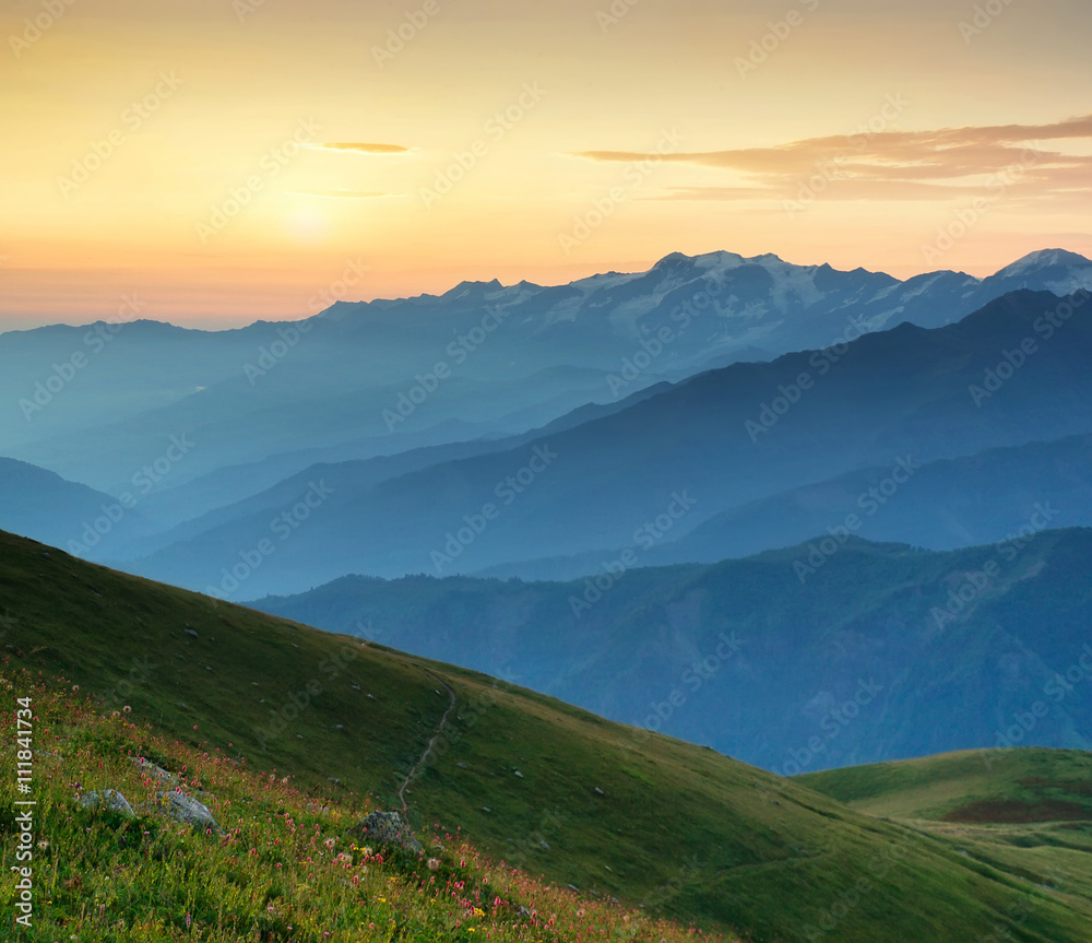 Fototapeta premium Mountain ridge during sunrise. Beautiful natural landscape in the summer time