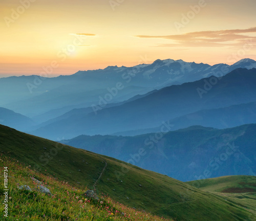 Mountain ridge during sunrise. Beautiful natural landscape in the summer time