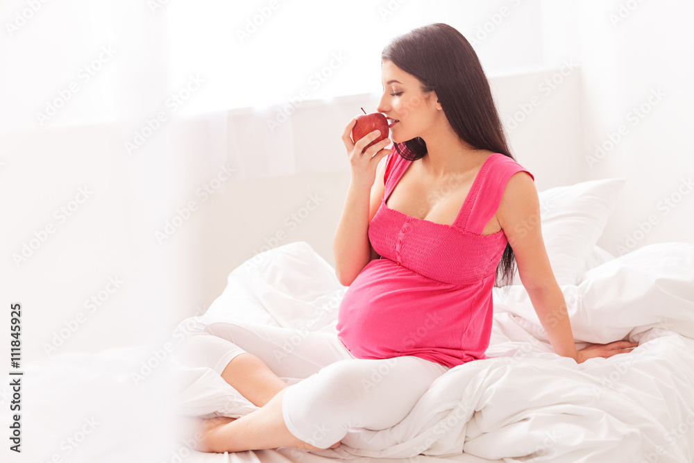 Pretty expectant mother prefers healthy food Pretty expectant mother prefers healthy food