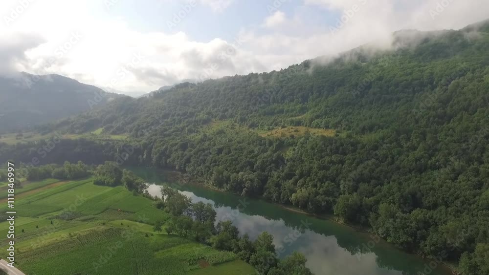 Flight over the river Drina Serbia. Aerial view of river Drina. Footage recorder from drone in full HD resolution.Aerial view of fields and meadows. Aerial view of the woods and the river Flight over the river Drina Serbia. Aerial view of river Drina. Footage recorder from drone in full HD resolution.Aerial view of fields and meadows. Aerial view of the woods and the river