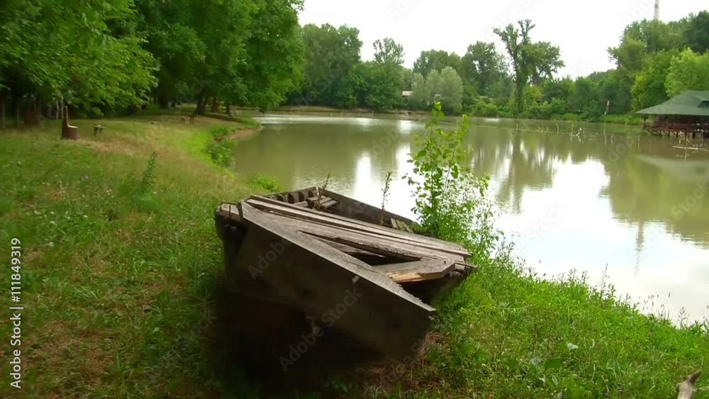 Tranquil Lake Clip. Nature, Outdoors, On A Beautiful Day With Wooden Boat On Shore
Tranquil Lake Clip. Nature, Outdoors, On A Beautiful Day With Wooden Boat On Shore
