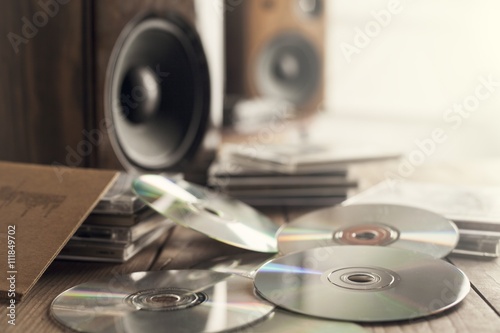 Rows of music cds with speakers photo