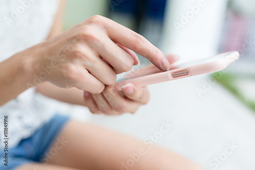Woman hold with mobile phone