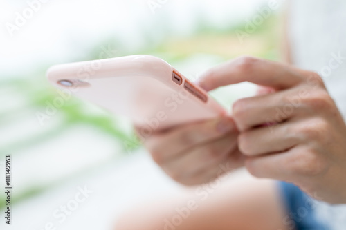 Woman use of phone for browsing internet