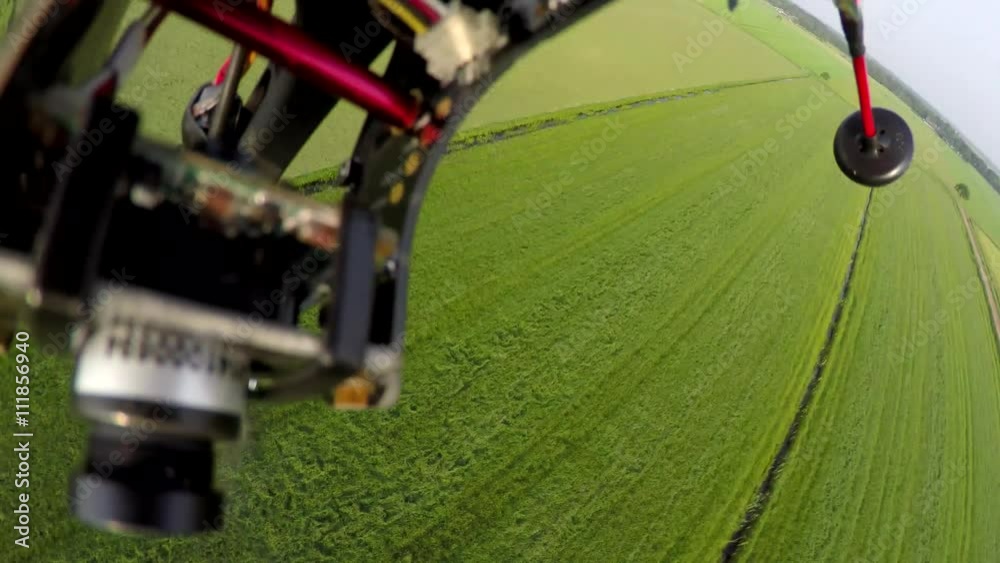 First person view onboard drone having technical failures crashing into ground fast and hard crash drone accident crash into grass farm landscape quadcopter electronics and extra camera showing 4k